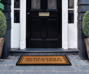 Black Welcome To Our Home Doormat